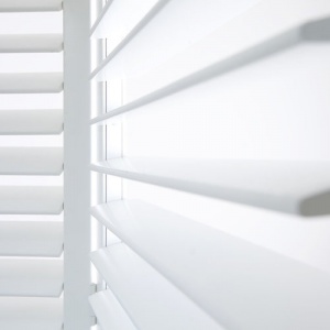 Close up of white shutters in the open position