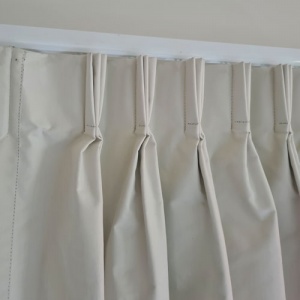 Triple pleated lined curtains