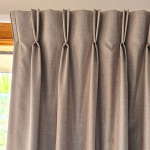 Twin pleated drapes